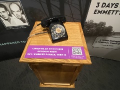 AnoldrotaryphonesittingonapodiuminvitingvisitorstolistentoaneyewitnessaccountfromRevWheelerParker